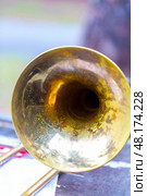 Trombone - fragment of wind brass orchestral musical instrument. Стоковое фото, фотограф Евгений Ткачёв / Фотобанк Лори