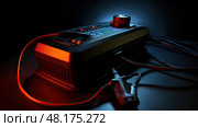 dead car battery charger ai generated. Стоковое AI-изображение, AI-художник Vectorwin / Фотобанк Лори