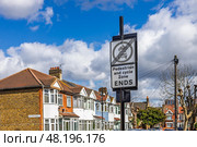 Traffic signs indicating pedestrian and cycle zone ends. London, UK, 24 March 2024. Стоковое фото, фотограф Zydrius Tartenis / Фотобанк Лори