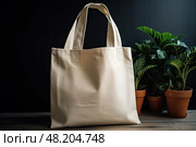 Beige eco-friendly cotton shopping bag intended for reusable grocery shopping on wooden table with plants in pots. Empty tote made of organic cotton canvas, suitable for repeated use during shopping trips. Стоковое AI-изображение, AI-художник Данила Большаков / Фотобанк Лори