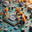 Miniature workers in a microworld repair circuit board and microchip. Tiny figures wear safety gear, use tools, interact with electronic components, highlighting teamwork in electronics maintenance. Стоковое AI-изображение, AI-художник Андрей Ка / Фотобанк Лори