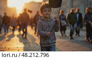 A child holding a small black flag, standing in a crowded street at sunset, the golden light casting long shadows as people march. Стоковое AI-видео, аниматор Sergey Grishin / Фотобанк Лори