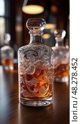 Elegant liquor decanter with floral ornaments, vintage vibe for luxury barware collection or spirit serving. Стоковое AI-изображение, AI-художник Данила Большаков / Фотобанк Лори