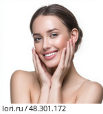 Radiant Woman Touching Flawless Skin, Spa and Skincare Glow Portrait on White. Лучезарная женщина, прикасающаяся к безупречной коже, спа и уход за кожей сияние портрет на белом. Стоковое AI-изображение, AI-художник Katsiaryna Repich / Фотобанк Лори
