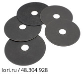 Отрезные круги для шлифовальной машинки на белом фоне. Cut-off wheels for grinder on white background. Стоковое фото, фотограф Татьяна Д / Фотобанк Лори