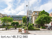 facade of AP-HP Peacekeepers Hospital in boulevard Saint-Marcel in summer day (2018 год). Редакционное фото, фотограф Ирина Мойсеева / Фотобанк Лори