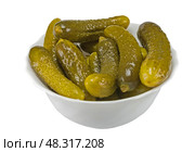 Тарелка с солеными огурцами на белом фоне. Some pickled cucumbers in a glass bowl on a white background. Стоковое фото, фотограф Татьяна Д / Фотобанк Лори