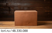 unmarked plain brown box ai generated. Стоковое AI-изображение, AI-художник Vectorwin / Фотобанк Лори