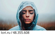 Rain Serenity: A portrait of a woman in a rain hood, finding peace in the downpour, design for wellness blog and mindful living concept. Стоковое AI-изображение, AI-художник Данила Большаков / Фотобанк Лори