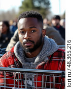 A young man dressed warmly with a red flannel jacket sits in line, showing a calm demeanor while waiting at a community event outdoors. Стоковое AI-изображение, AI-художник Данила Большаков / Фотобанк Лори