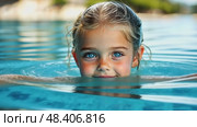 Smiling blonde girl swims in a clear blue pool, her face reflecting joy, innocence, and summer happiness. Стоковое AI-видео, аниматор Данила Большаков / Фотобанк Лори