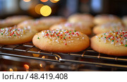 festive sugar cookies in kitchen ai generated. Стоковое AI-изображение, AI-художник Vectorwin / Фотобанк Лори