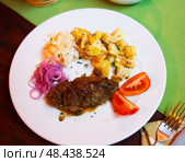 Plate with a meat dish lula-kebab and stewed potatoes. Стоковое фото, фотограф Яков Филимонов / Фотобанк Лори