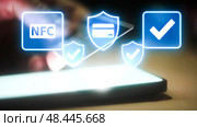 Contactless payment interaction with nfc enabled card over smartphone screen. Стоковое AI-изображение, AI-художник Владимир Федоров / Фотобанк Лори