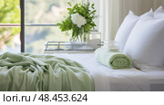 bedspread green and white towels ai generated. Стоковое AI-изображение, AI-художник Vectorwin / Фотобанк Лори
