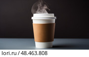 sleeve coffee in white paper cup ai generated. Стоковое AI-изображение, AI-художник Vectorwin / Фотобанк Лори