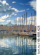 The Old Port Vieux Port of Marseille with Basilique Notre-Dame de la Garde blurred in the fog and the yauchts (2018 год). Стоковое фото, фотограф Сергей Богомяко / Фотобанк Лори
