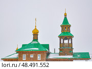 Церковь святого апостола Андрея Первозваного зимой во время снегопада. Село Вагай. Омутинский район. Тюменская область (2018 год). Стоковое фото, фотограф Александр Тараканов / Фотобанк Лори