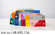 finance credit card on white ai generated. Стоковое AI-изображение, AI-художник Vectorwin / Фотобанк Лори