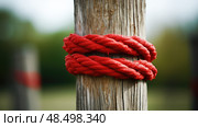 wooden red ropes tied ai generated. Стоковое AI-изображение, AI-художник Vectorwin / Фотобанк Лори
