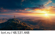 Mountaintop Cross Silhouette Against a Vibrant Dawn. Стоковое AI-изображение, AI-художник Данила Большаков / Фотобанк Лори