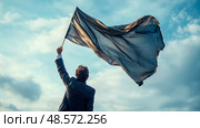 Concept: Surrender. A figure raises a black flag against the sky, a symbol of submission or defeat, expressing resignation or acceptance. Стоковое AI-изображение, AI-художник Данила Большаков / Фотобанк Лори