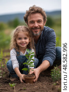 A smiling father and his daughter kneel beside a freshly planted tree in the garden, sharing a moment of joy and connection outdoors. Стоковое AI-изображение, AI-художник Данила Большаков / Фотобанк Лори