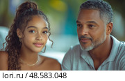 A father and daughter share a joyful moment outdoors, engaging in a light-hearted conversation surrounded by vibrant greenery on a sunny day. Стоковое AI-изображение, AI-художник Данила Большаков / Фотобанк Лори