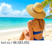 A beautiful girl in a swimsuit and a wide-brimmed straw hat on the beach on a sunny day looks at the surf. Стоковое AI-изображение, AI-художник Сергей Елизарьев / Фотобанк Лори