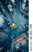 Industrial Oversight: Aerial View of a Plant Worker and Detailed Infrastructure. Стоковое AI-изображение, AI-художник Данила Большаков / Фотобанк Лори