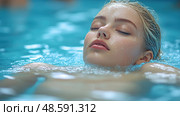 A young woman enjoys a peaceful moment floating in a clear blue pool, absorbing the warmth of a sunny day while feeling relaxed and refreshed. Стоковое AI-изображение, AI-художник Данила Большаков / Фотобанк Лори