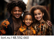 Joyous bond of stylish young family, coordinating in floral autumn attire, exuding warmth and togetherness amidst urban backdrop. Стоковое AI-изображение, AI-художник Данила Большаков / Фотобанк Лори