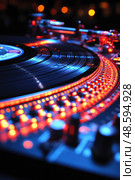 A vibrant turntable illuminated by colorful lights is playing a vinyl record at a lively night music event, creating an energetic atmosphere. Стоковое AI-изображение, AI-художник Данила Большаков / Фотобанк Лори