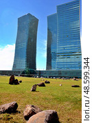 The construction of modern buildings in Astana, Kazakhstan (2011 год). Редакционное фото, фотограф Александр Карпенко / Фотобанк Лори