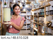 Woman with table lamp in store. Стоковое фото, фотограф Яков Филимонов / Фотобанк Лори