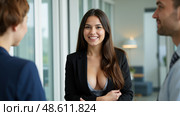 Office flirtation and romance, woman draws attention of male coworkers, inappropriate work outfit, workplace attraction, corporate environment, unprofessional attire, workplace relationships. Стоковое AI-изображение, AI-художник Павел Муравьев / Фотобанк Лори