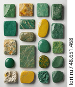A beautiful assortment of unakite mineral stones, showcasing their diverse textures and hues. These stunning metamorphic rocks capture natures artistry in a captivating display Generative AI. Стоковое AI-изображение, AI-художник Юлия Петровская / Фотобанк Лори
