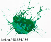 Green paint spot on paper, colorfull artistic image on white background. Стоковое фото, фотограф Яков Филимонов / Фотобанк Лори