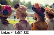 woman in hat at ascot racecourse. Стоковое AI-изображение, AI-художник Anastasy Yarmolovich / Фотобанк Лори