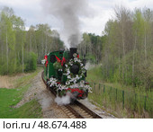 Паровоз Гр-318 движется тендером вперед по станции Екатеринбург-Детский, Екатеринбургская ДЖД, Свердловская область. Редакционное фото, фотограф Алексей Иванов / Фотобанк Лори