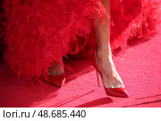 Ноги, обутые в красные туфли на высоком каблуке. Стоковое фото, фотограф Артем Геодакян / ТАСС / Фотобанк Лори