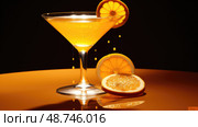 garnish orange juice cocktail ai generated. Стоковое AI-изображение, AI-художник Vectorwin / Фотобанк Лори