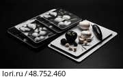 dicing black and white cutting board ai generated. Стоковое AI-изображение, AI-художник Vectorwin / Фотобанк Лори
