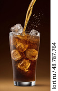 Pouring carbonated drink into glass with ice cubes on brown background. Стоковое AI-изображение, AI-художник Юрий Поздников / Фотобанк Лори