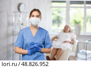 Young doctor with mask. Стоковое фото, фотограф Яков Филимонов / Фотобанк Лори