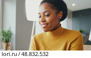 Beautiful, attractive, black African American woman yellow sweater and shining smile confidently looking at camera, 4k, active lifestyle. Business concept, thinking something, passionate about hobby. Стоковое AI-видео, аниматор ALLA YURTAYEVA / Фотобанк Лори