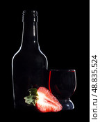 Glass bottle on black. Стоковое фото, фотограф Николай Григорьев / Фотобанк Лори