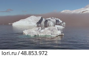 Big Iceberg in Antarctica Winter Scenery, Amazing Shape Ice Formation of Massive Large Enormous Blue Icebergs in Antarctic Peninsula Landscape Seascape with Ocean Sea Water. Стоковое видео, видеограф Vladimir / Фотобанк Лори