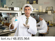 Portrait of an adult male using equipment to work in a laboratory. Стоковое фото, фотограф Яков Филимонов / Фотобанк Лори