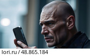 A man talks on the phone with scammers for a long time. Стоковое AI-изображение, AI-художник Александр Поташев / Фотобанк Лори